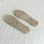 Natural pressed wool insoles with foil