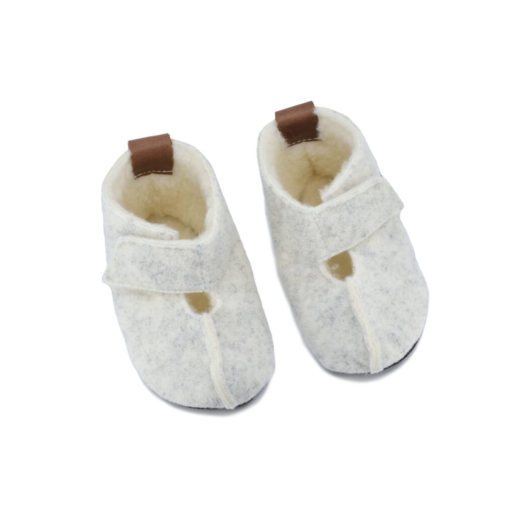 Children's light-coloured natural wool knitted boots