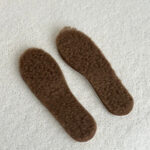 Natural pressed camel wool insoles