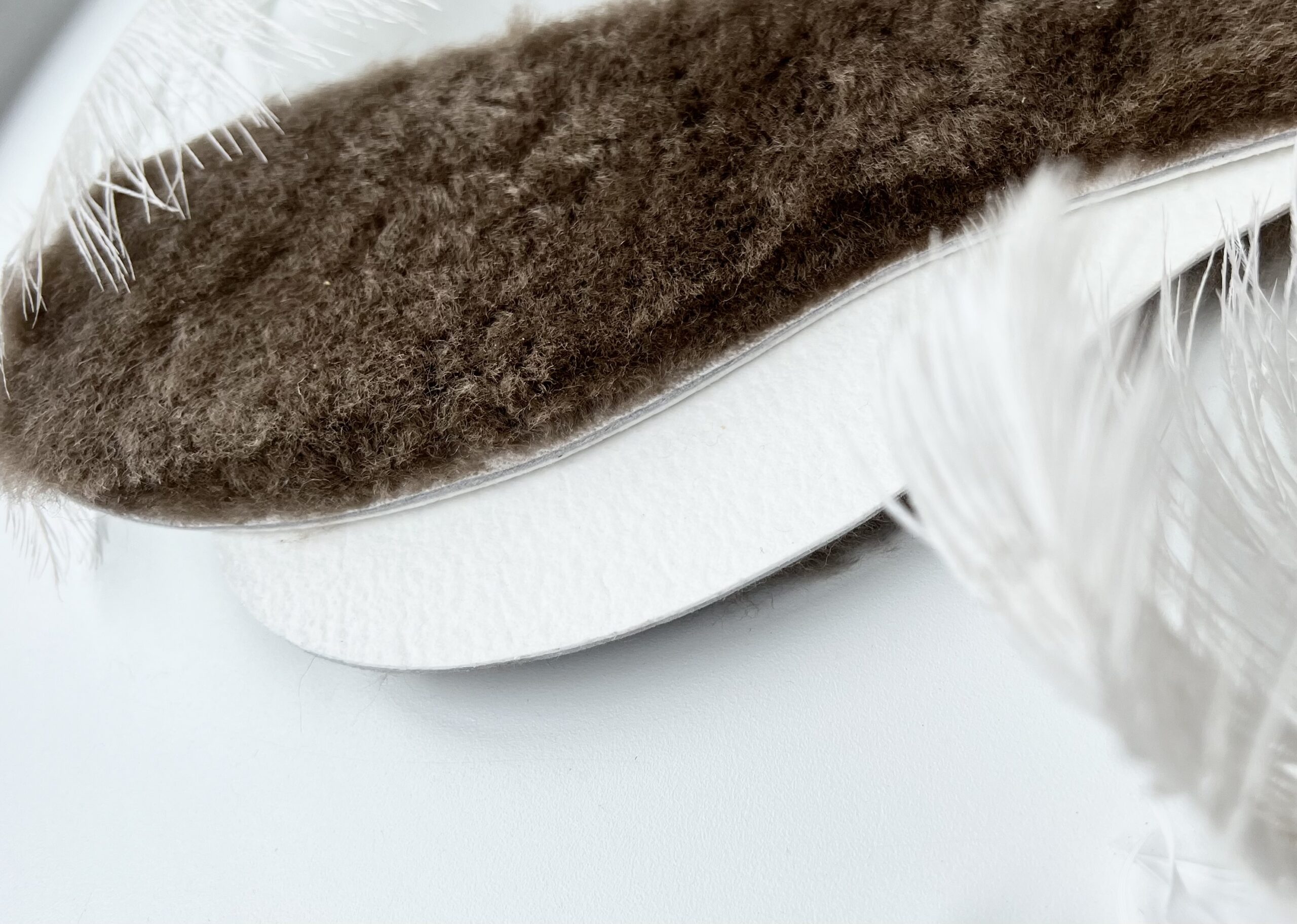 Natural fur insoles with latex