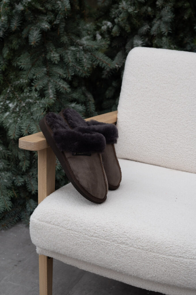 WoolLando women's dark leather slippers in genuine fur