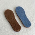 Natural pressed camel wool insoles